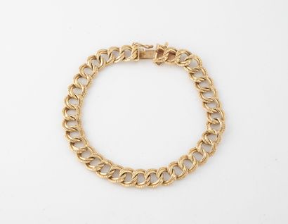 Bracelet à maille gourmette doublée en or...