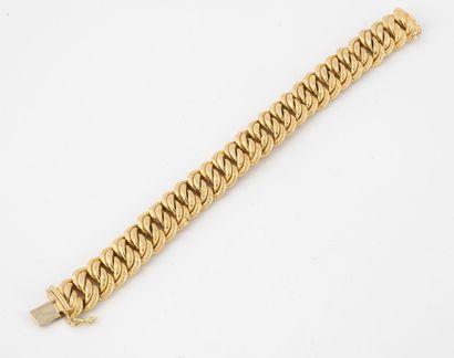 Bracelet en or jaune (750) à maille américaine...