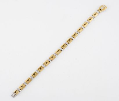 CHIMENTO
Bracelet en ors jaune et gris (750)...