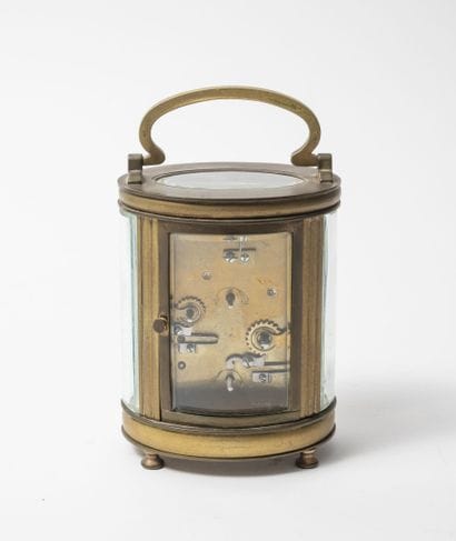 Pendulette d'officier à cage en laiton doré,...