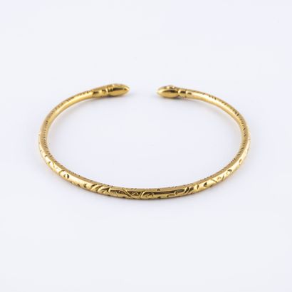 Bracelet jonc en or jaune (750) à têtes de...