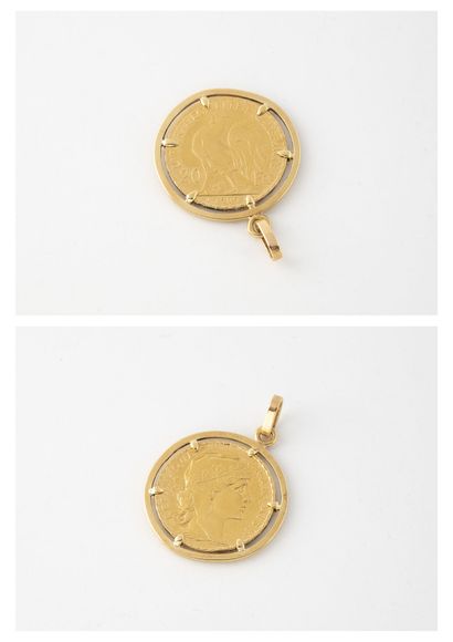 Pendentif en or jaune (750) retenant en serti...