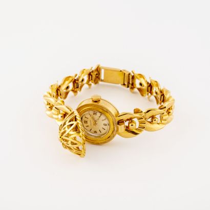 ZENITH
Montre bracelet de dame en or jaune...