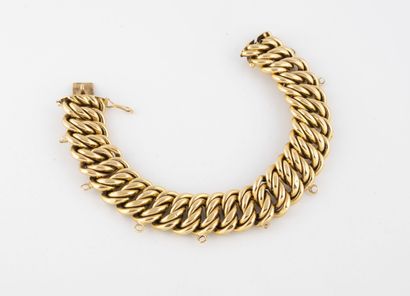 Bracelet en or jaune (750) à maille américaine.

Fermoir...