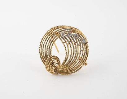 Broche noeud ronde en filins d' or jaune...