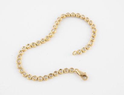 Bracelet ligne en or jaune (750) articulé...