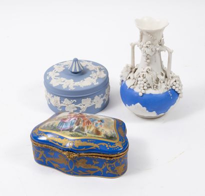 Covered round box with decoration of vine...