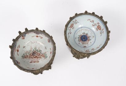 Two Asian porcelain cups with Imari decoration.

Mounts...