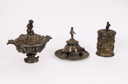 Three pieces of form out of metal or silver...