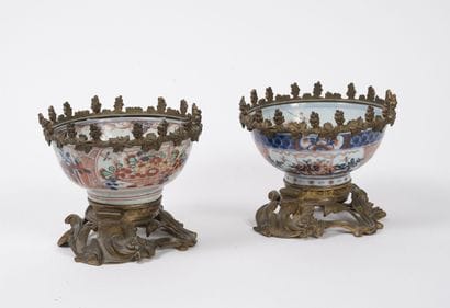 Two Asian porcelain cups with Imari decoration.

Mounts...