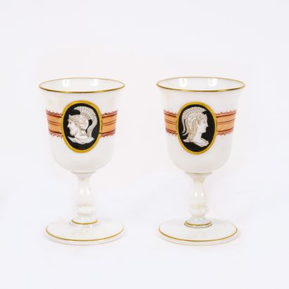 Two glasses on foot out of white opaline...