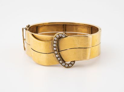 Rigid belt bracelet in yellow gold (750)...