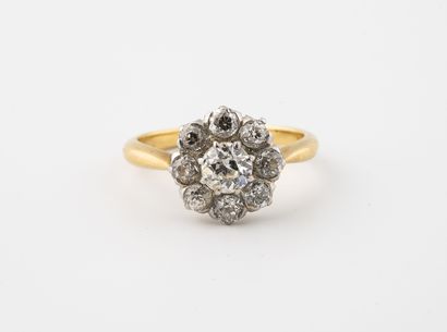 Bague marguerite en or jaune (750) ornée...