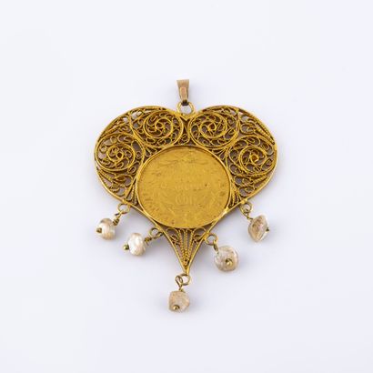 Pendentif coeur en or jaune (750) filigrané...