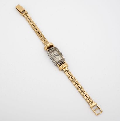 Ladies' wristwatch.

Rectangular case in...