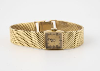 TISSOT
Lady's wristwatch in yellow gold (750).

Square...
