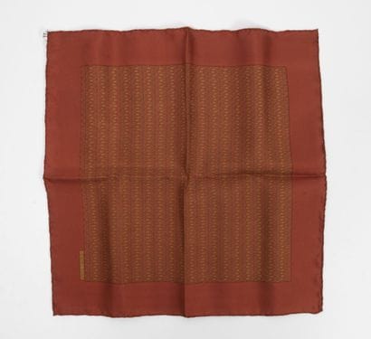 HERMES Paris
Brick colored silk man pouch...