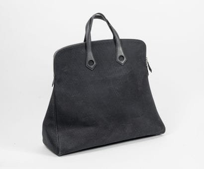 HERMES Paris
Heboo travel bag in black canvas...