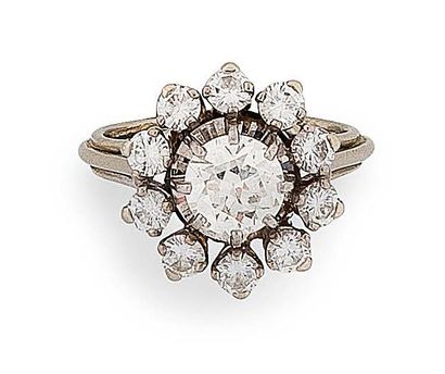 Bague marguerite en or gris (750) et platine...