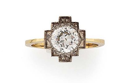 Bague en ors jaune et gris (585) à chaton...