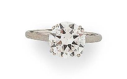 Bague solitaire en or gris (750) et platine...