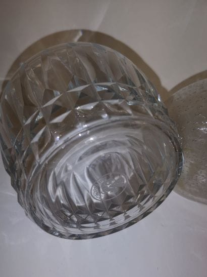 Two carafons out of colorless glass :

-...