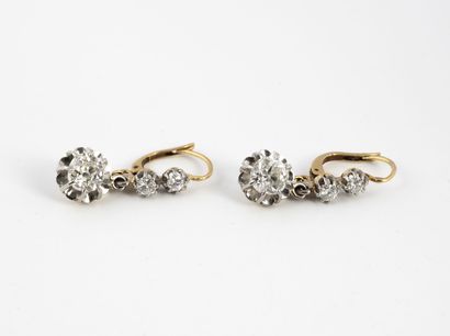 Pair of yellow gold (750) and platinum (850)...