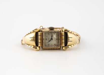 Yellow gold (750) lady's wristwatch.

Square...