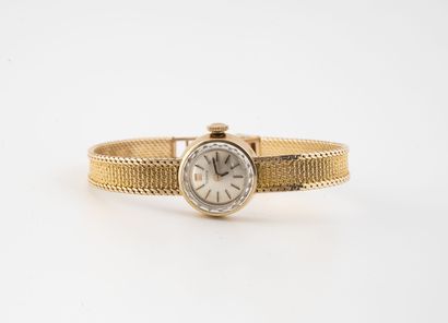 TISSOT
Lady's wristwatch in yellow gold (750)....