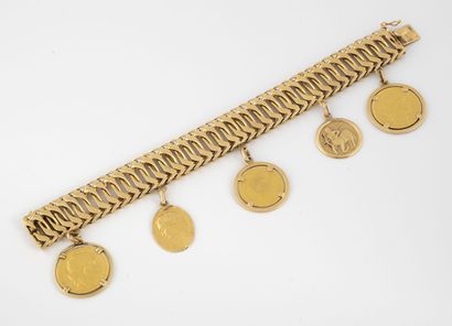 Bracelet en or jaune (750) à maille gourmette...