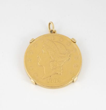 ÉTATS UNIS
Yellow gold (750) pendant adorned...