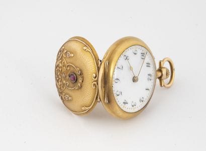 Yellow gold (750) collar watch.

Back decorated...