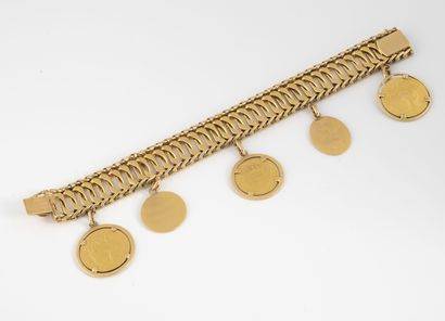 Bracelet en or jaune (750) à maille gourmette...