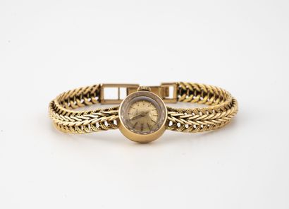 ZENITH
Lady's wristwatch in yellow gold (750).

Round...