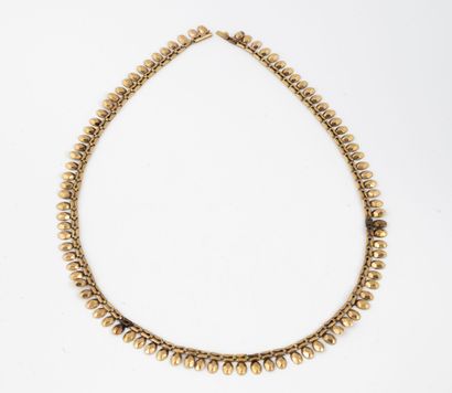 Petit collier en or jaune (750) à maillons...