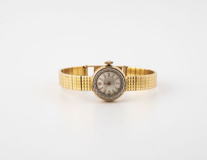 TISSOT
Lady's wristwatch in yellow gold (750)....