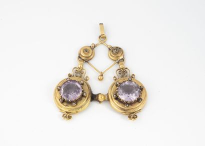 Yellow gold (750) pendant made up of two...