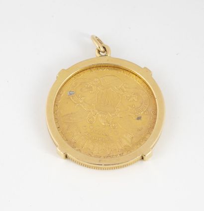 ÉTATS UNIS
Yellow gold (750) pendant adorned...