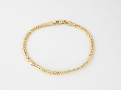 Bracelet in yellow gold (750) with flattened...