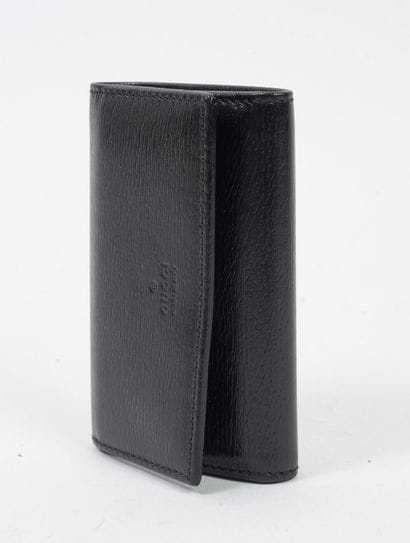 GUCCI
Black leather key case.

6,5 x 9,5...