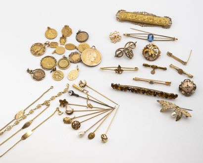 Lot of costume jewelry in gold metal including...