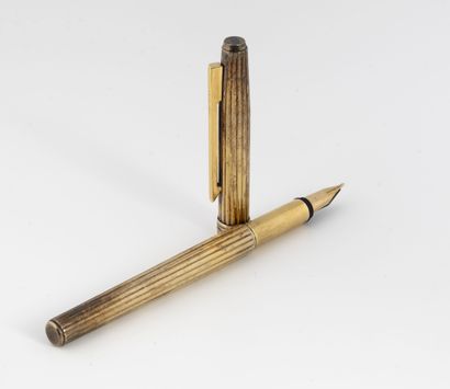 CHRISTIAN DIOR
Silver (800) gilt and metal...