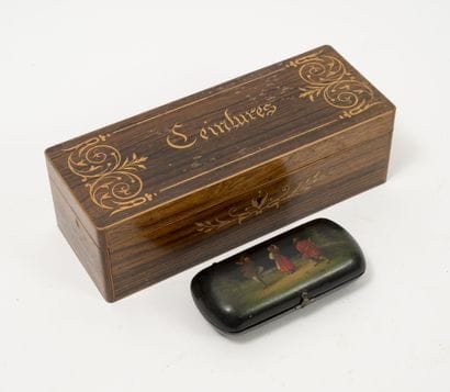 Three paperweights :

- one with a laureate...