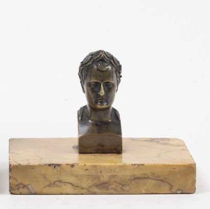 Three paperweights :

- one with a laureate...