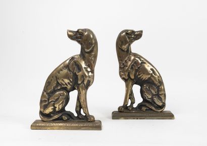 Pair of andirons with sitting dogs in bronze...