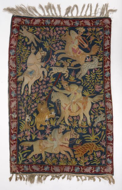 Suzani.

Chasse au lion. 

Bordure florale...