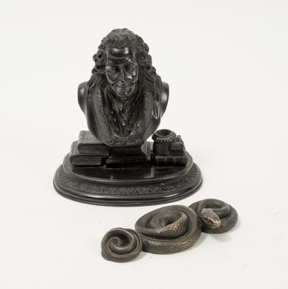 Three paperweights :

- one with a laureate...