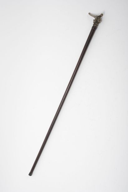 Wooden cane with its silver-plated bronze...