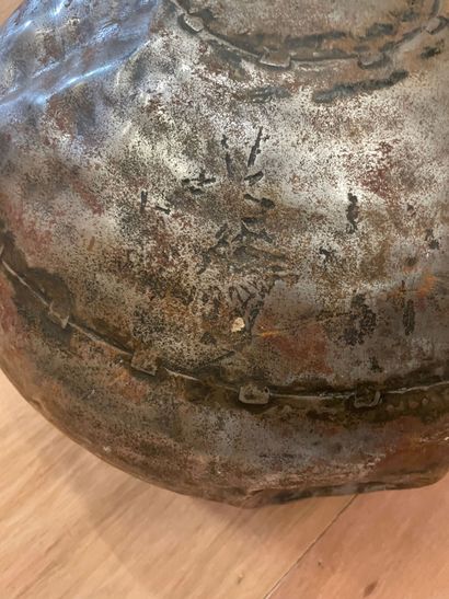 
Large flask with circular body in iron sheet.




Ringed...