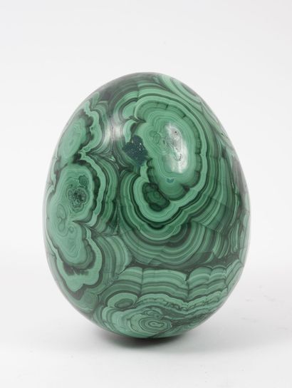 Important egg in malachite.

Weight 5000...